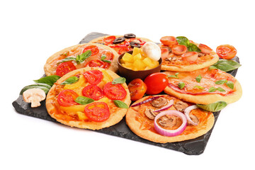 Board with different tasty mini pizzas on white background