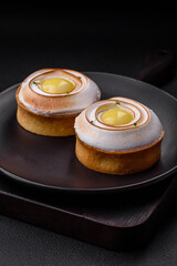 Delicious tart with citrus filling and walnut cream