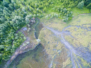 Aerial view of old liquid waste storage used by steel mill, overgrown with plants, Krakow, Poland