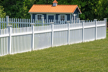 white vinyl fence fencing of private property grass plastic nature