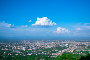 Landscape view and white clouds floating in the middle of the city