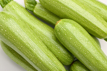 Many fresh green zucchini, closeup