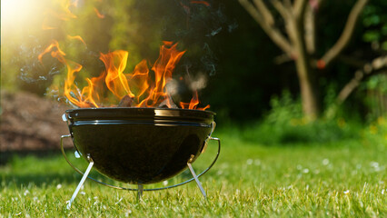 Barbecue Grill with Fire on Open Air. Fire flame