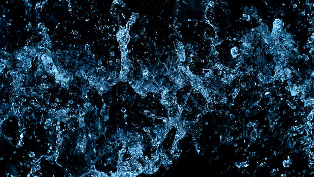 Abstract water splashes isolated on black background.