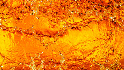 Liquid golden splash texture, abstract beverages background.