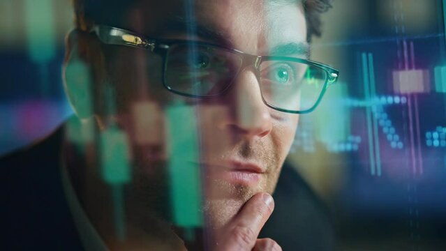 Closeup stock market analyst with economic holographic data. Smiling man trader