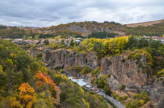 Colorful autumn view from the bridge to spa resort city Jermuk and canyon of Arpa river. Armenia