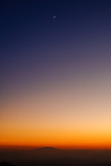 clear twilight sunset sky with crescent Moon and Venus 