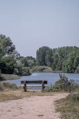 Fototapeta na wymiar bench on a lake side