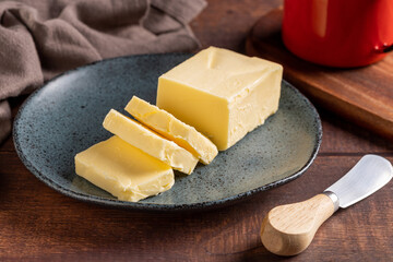Fresh butter from the farm on the table. Butter tablet.
