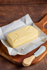 Fresh butter from the farm on the table. Butter tablet.