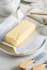 Fresh butter from the farm on the table. Butter tablet.