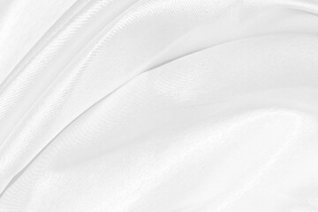 white silk textured cloth background,Closeup of rippled satin fabric with soft waves.