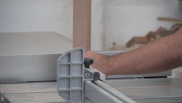 working with wood on the planer, planing machine, thicknessing machine.