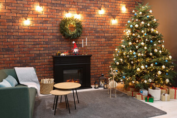 Beautiful tree with festive lights and Christmas decor in living room. Interior design
