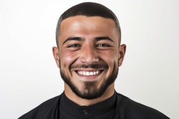 Fototapeta premium Portrait of a young man with a beard on a white background