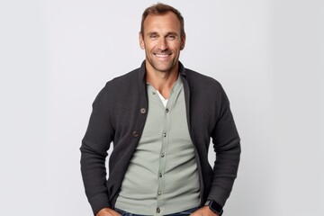 Fototapeta premium Portrait of a handsome mature man smiling and looking at camera.