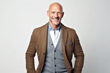 Fototapeta premium Portrait of a happy mature man smiling and looking at the camera