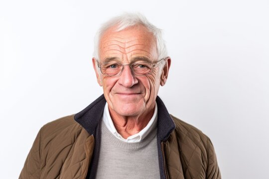 Portrait of a senior man with eyeglasses on white background
