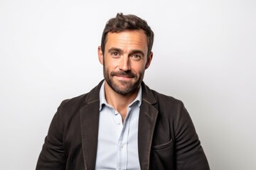 Handsome man with beard and mustache wearing a jacket on white background