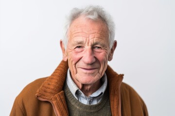 Portrait of an elderly man on a white background in the studio