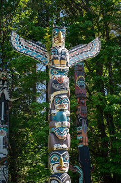 Vancouver, British Columbia - May 26, 2023: Totem poles in beautiful Stanley Park, Vancouver.