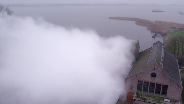 Close shot of steam rising at Woudagemaal Lemmer, Drone shot 4k