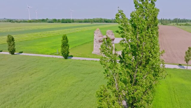 Ruins Of The Triumphal Arch Heathens' Gate In Carnuntum In Summer - aerial drone shot