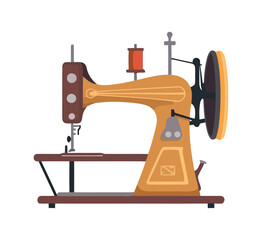 Sewing equipment and spools on wooden table