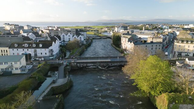 Cinematic Drone Shot Above River Corrib in Galway City, Ireland. Typical Day