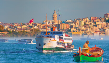 Obraz premium Sea voyage with old ferry (steamboat) in the Bosporus - Galata Tower, Galata Bridge, Karakoy district and Golden Horn, istanbul 