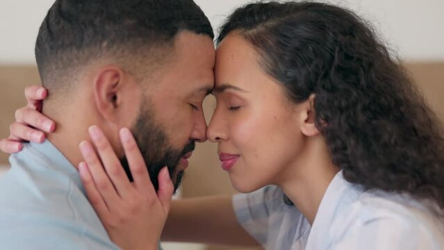 Bedroom, nose rub and couple love, affection and enjoy quality time together for care, support and relationship security. Marriage bond, home and face of intimate man, woman or people relax on bed