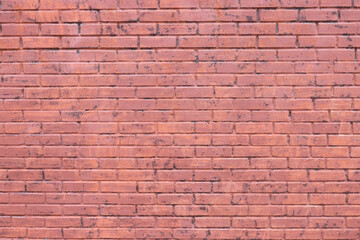 Old building wall made of red color bricks as background