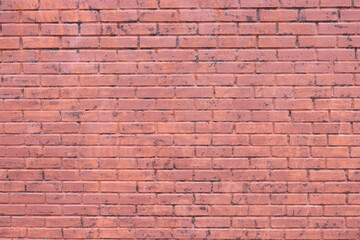Obraz premium Old building wall made of red color bricks as background
