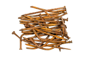 A pile of rusty nails on a white background. Old rusty nails.