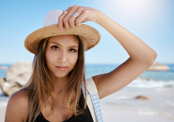 Woman, portrait at beach with travel and summer tropical vacation in Mexico with tourism and adventure. Female person is calm outdoor, relax on holiday with journey and nature, sun and sea waves