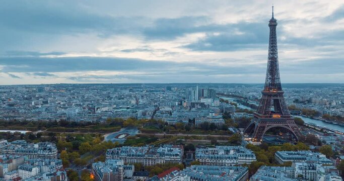 Hyper lapse aerial view towards the left side of the Eiffel Tower in Paris, France. France aerial view of the sunrise
