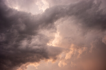 Fototapeta na wymiar golden cloud before the storm, twilight 
