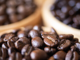 brown arabica coffee bean roast 3 level medium to dark different taste seed caffeine espresso drink food cafe beverage Chiang Rai, Thailand coffee on wooden table background top view selected focus