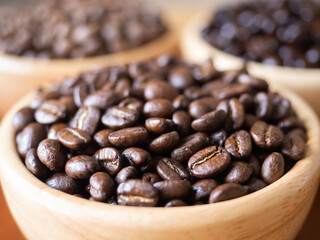 brown arabica coffee bean roast 3 level medium to dark different taste seed caffeine espresso drink food cafe beverage Chiang Rai, Thailand coffee on wooden table background top view selected focus - 608925382