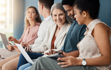 Hiring, technology and row business people for job interview, vacancy and opportunity in office. Recruitment, diversity and men and women talking with phone, tablet and laptop prepare for hr meeting