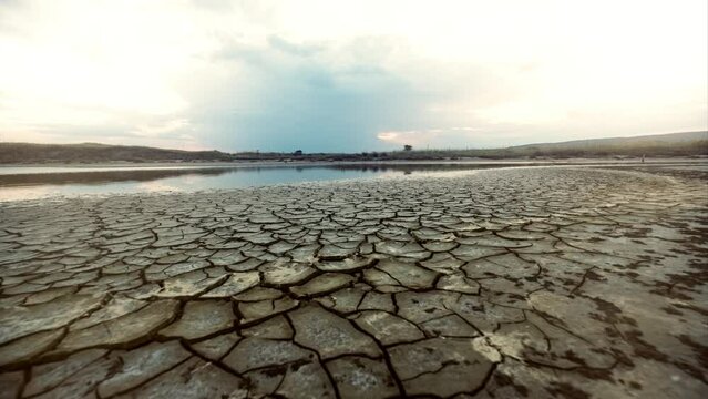 dry cracked earth in desert timelapse