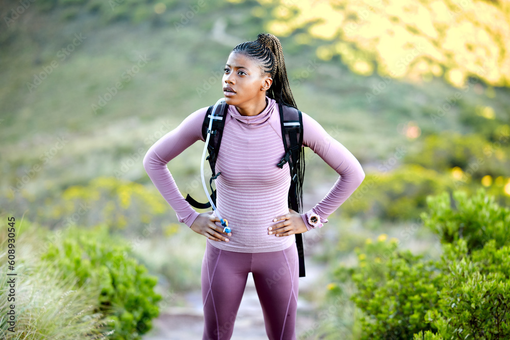 Poster Black woman, hiking and thinking outdoor in nature with a backpack for adventure, fitness and breathing. Tired african person with hands on hips for break from mountain climbing, exercise or trekking