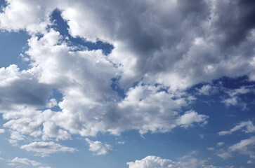 Abstract image of blurred sky. Blue sky background with cumulus clouds