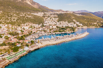 Aerial view of Kas Turkish coastal town and yacht marine. Wide shot