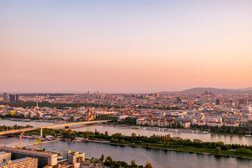 Fototapeta na wymiar Vienna at sunset. The view over Vienna at dusk. View over Austrian city before evening. Before evening in Vienna
