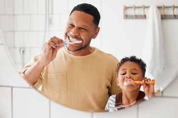 Brushing teeth, father and child in a home bathroom for dental health and wellness with smile. Face...