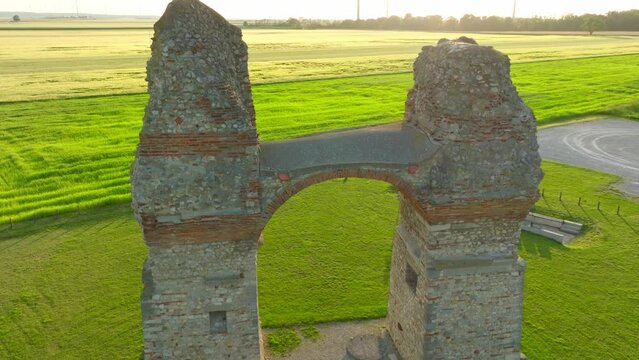 Heidentor Gate And Sunset Scenery In Petronell-Carnuntum, Lower Austria - aerial drone shot