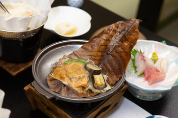 Hida Miso grill on Oba Leaf. Traditional HidaJapanese dining menu.with sashimi set