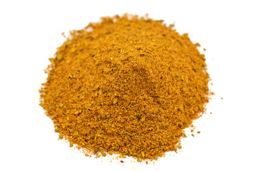 Powdered cajun spice isolated on white background. Dried ground cajun powder spices. Close up